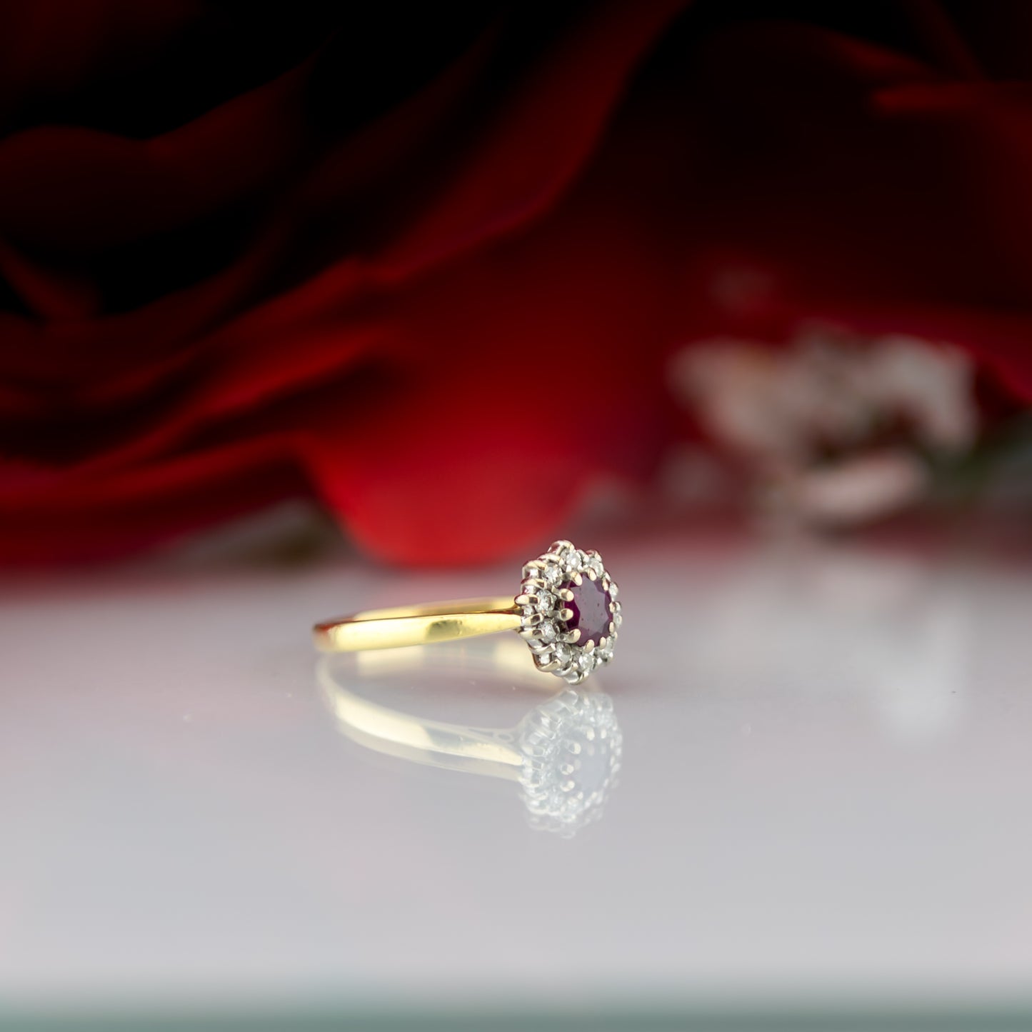 18ct Gold Ruby And Diamond Floral Oval Ring