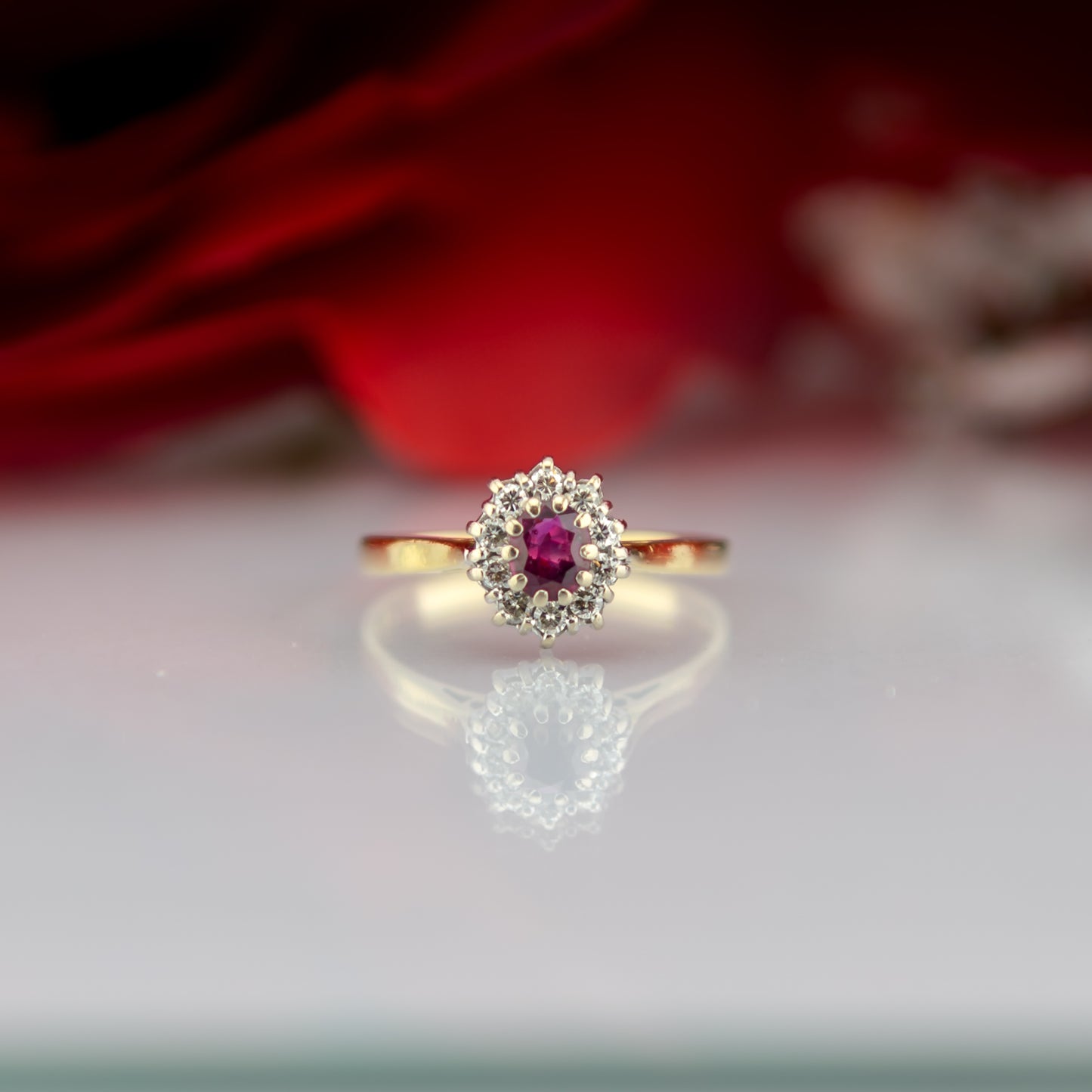 18ct Gold Ruby And Diamond Floral Oval Ring