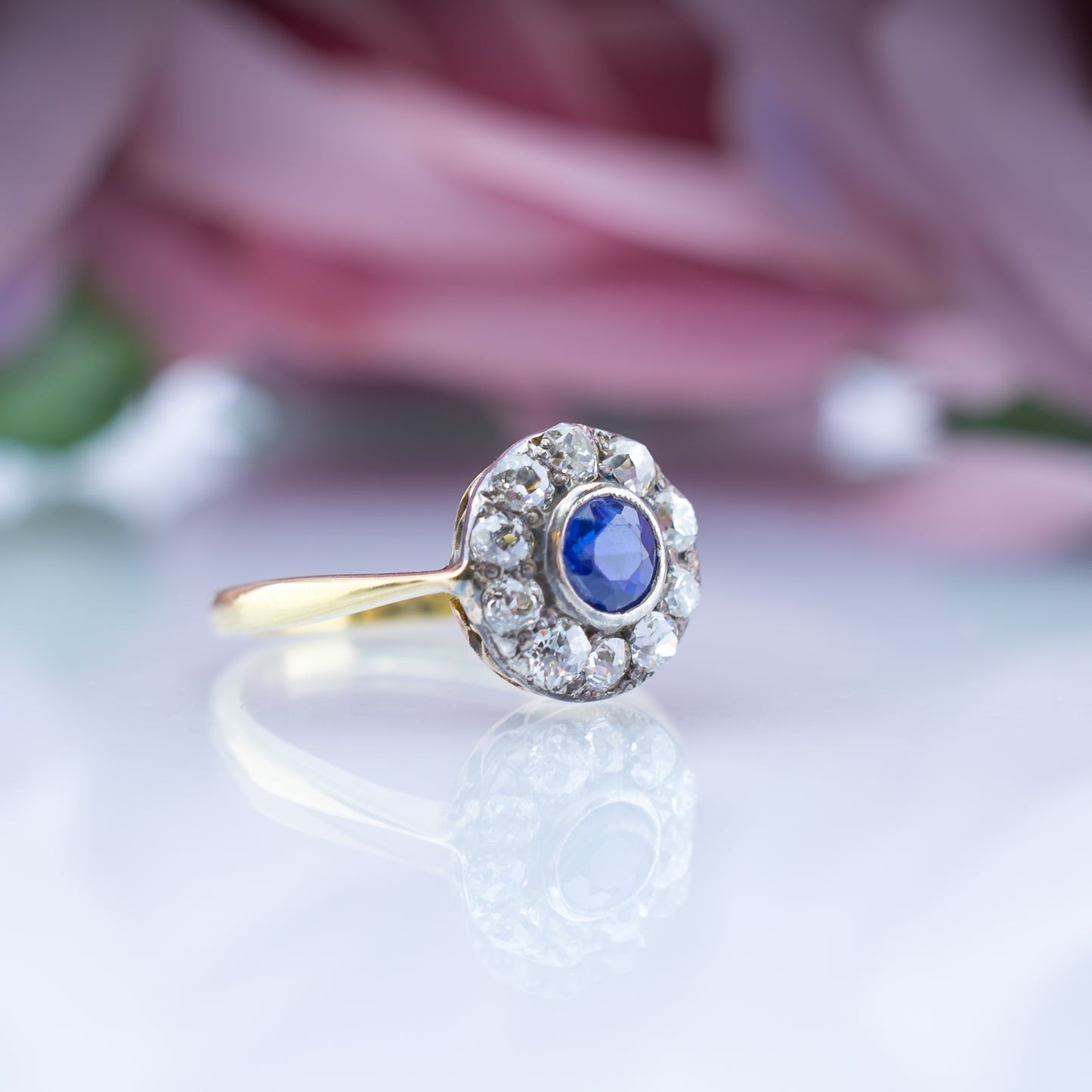 18ct Gold Sapphire And Diamond Deco Halo Ring